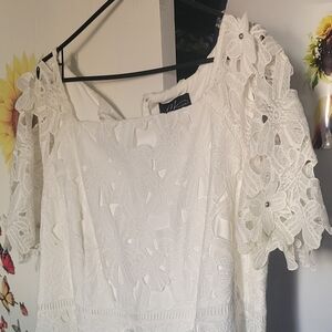 Fancy white dress with flower appliques